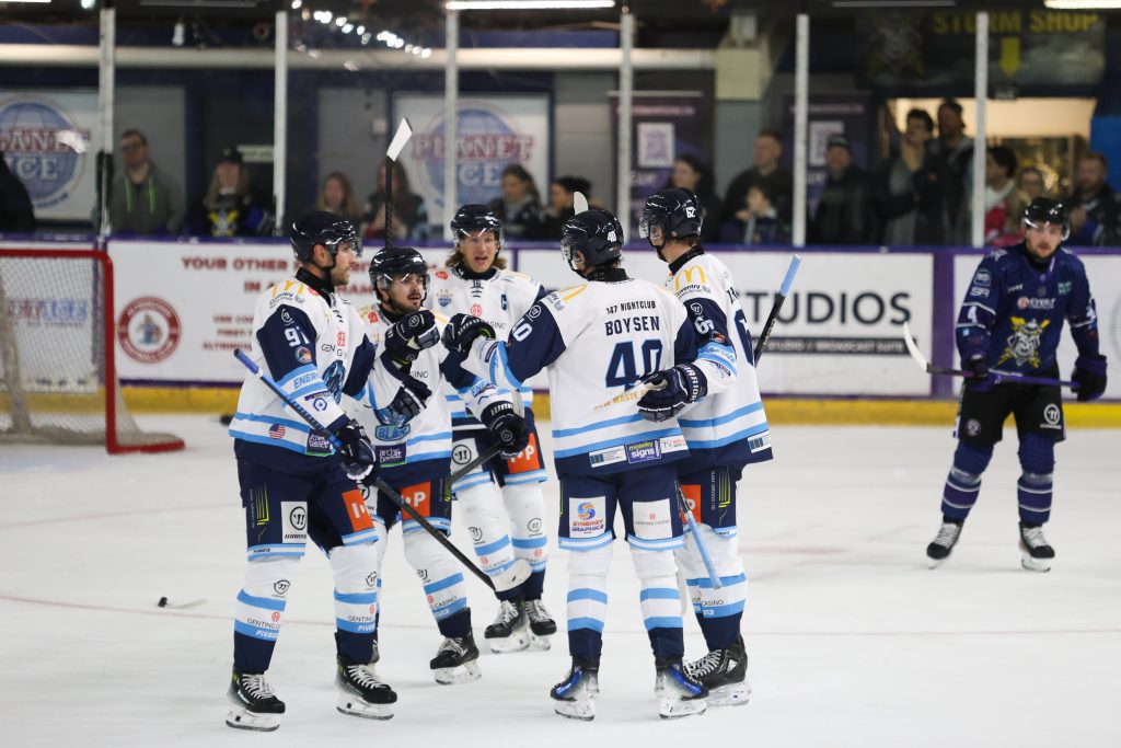 Coventry Blaze players celebrate scoring the second goal in Manchester.