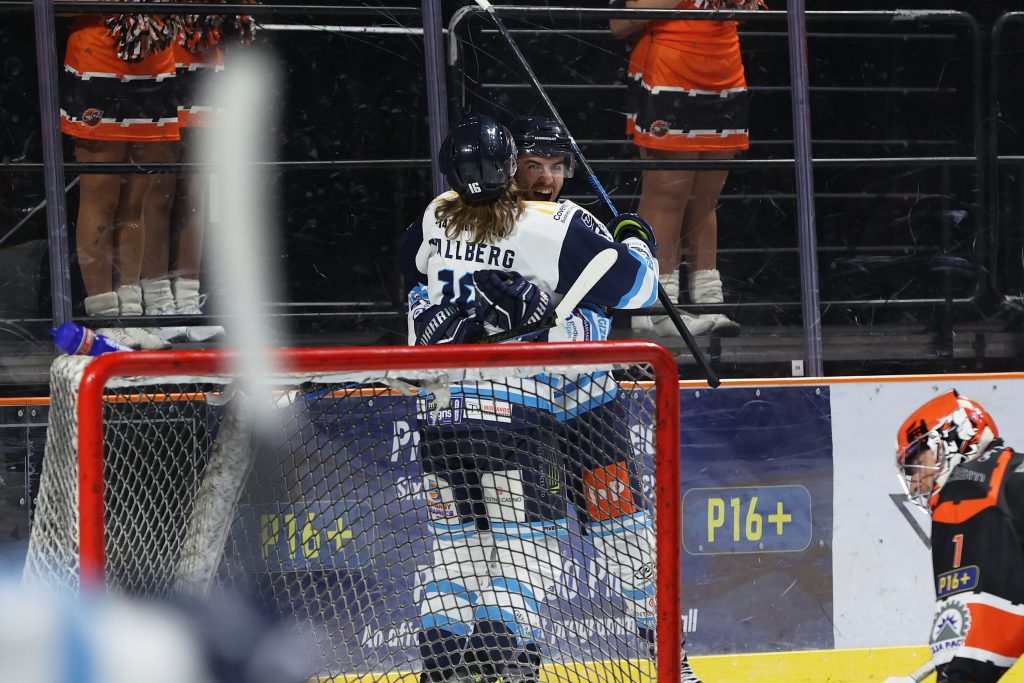 Blaze players celebrate scoring the second goal.