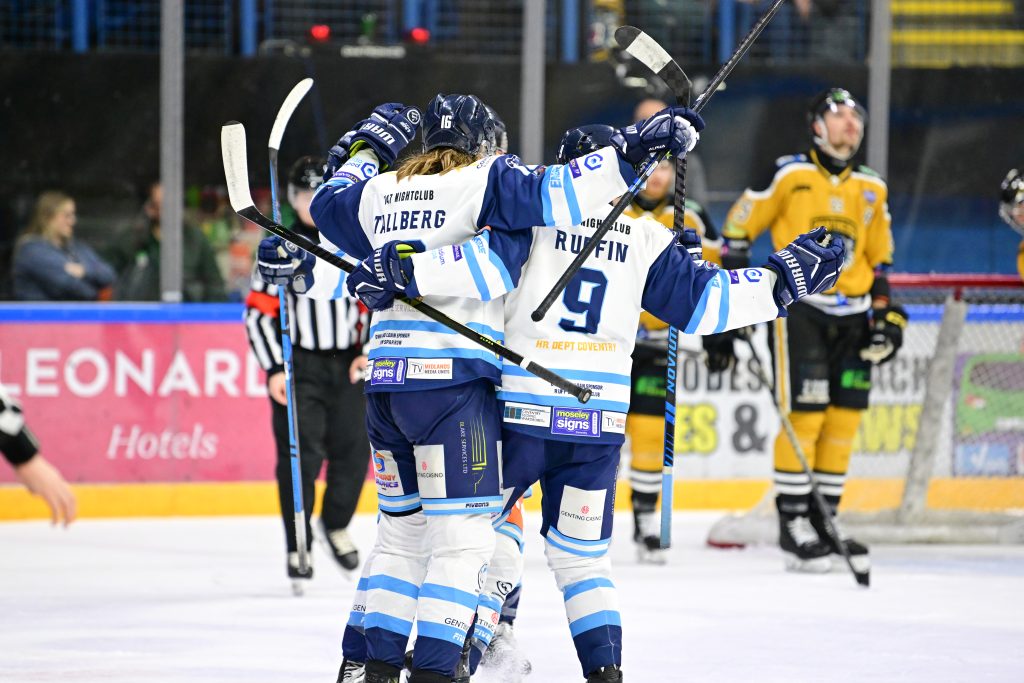 Kim Tallberg celebrates his goal with teammates.
