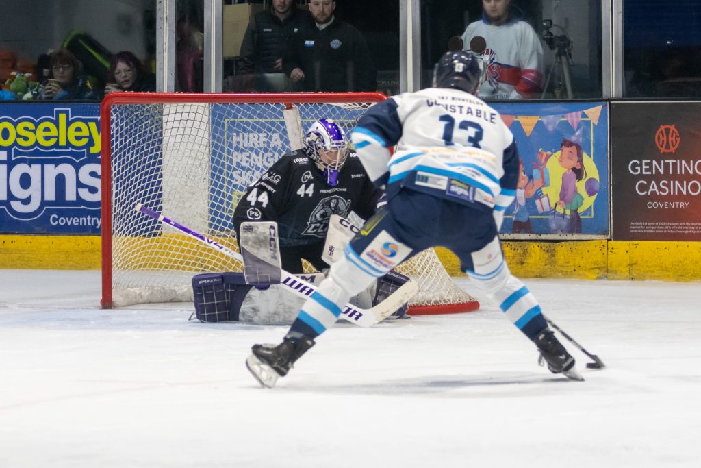 Grayson Constable skates in to goal before scoring.