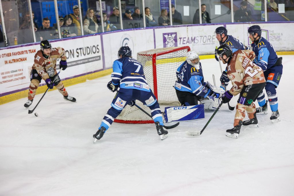 Stewart stretches with Haden lurking in front.