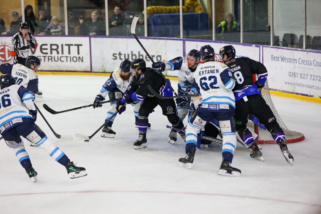 Battle around the net between players of the Blaze and Storm.