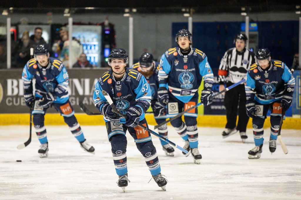 Gleason skates to the Blaze bench after scoring. 