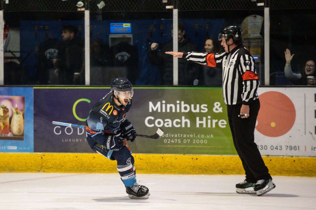 Gleason celebrates scoring on the penalty shot. 