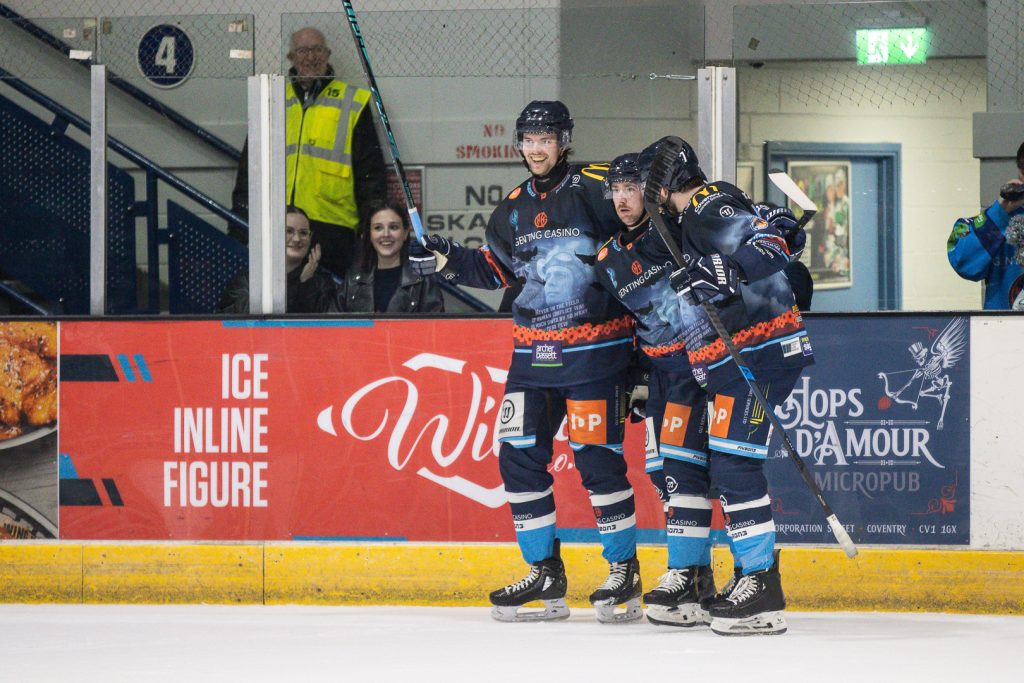 Ruffin celebrates his short-handed goal with teammates. 