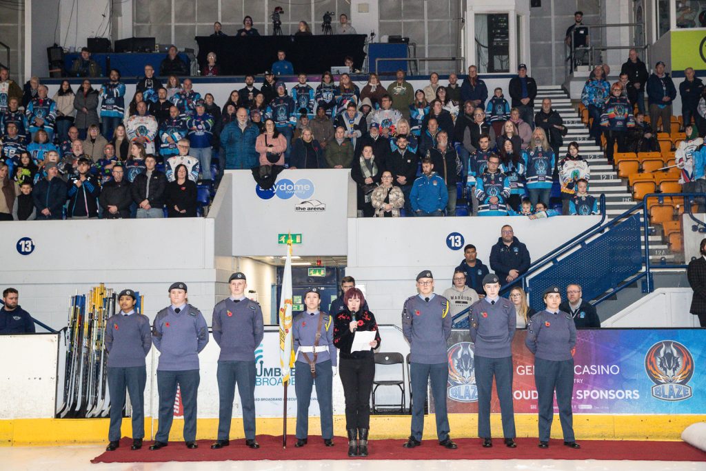 Justine Greene leads the Rememberance ceremony at the Skydome Arena 2025. 