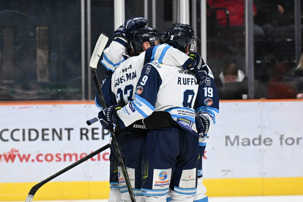 Blaze players celebrate victory.