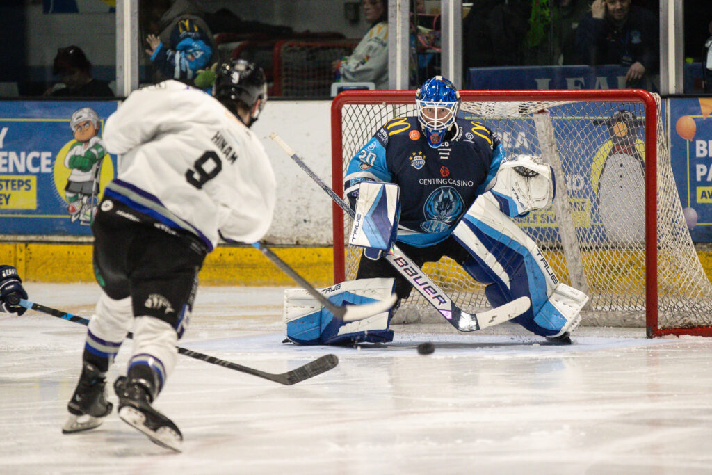 Robson prepares to make a save.