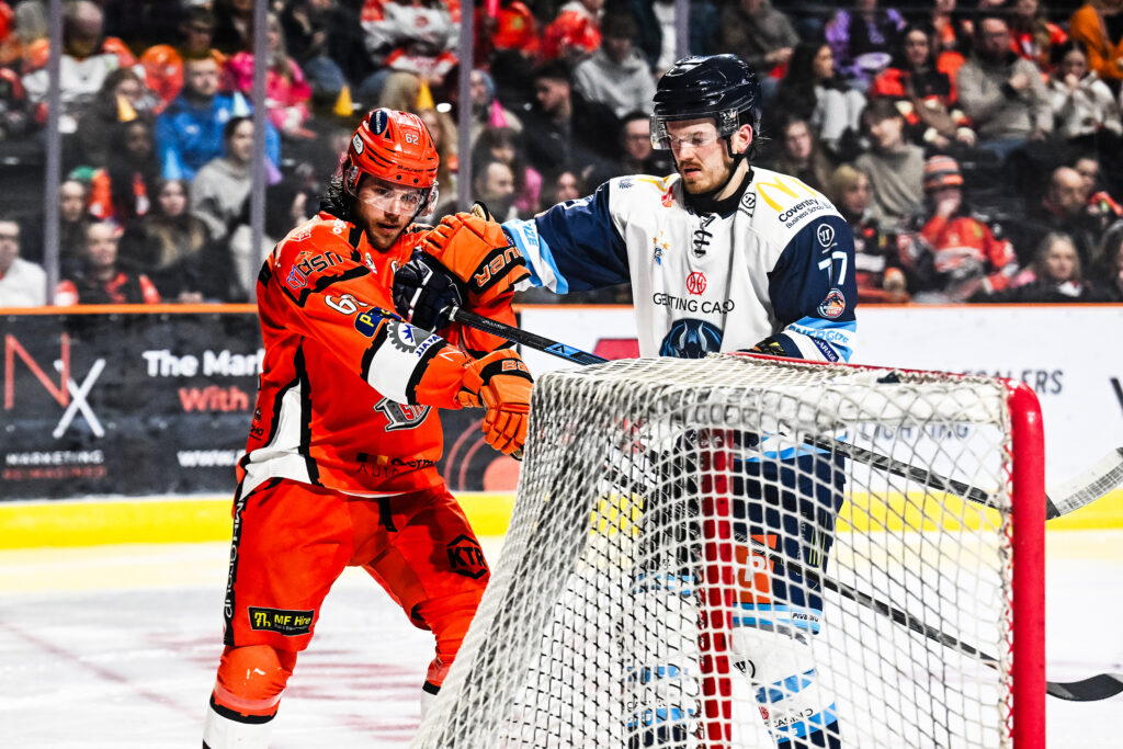 Power tangles with Jasper by the side of the net.