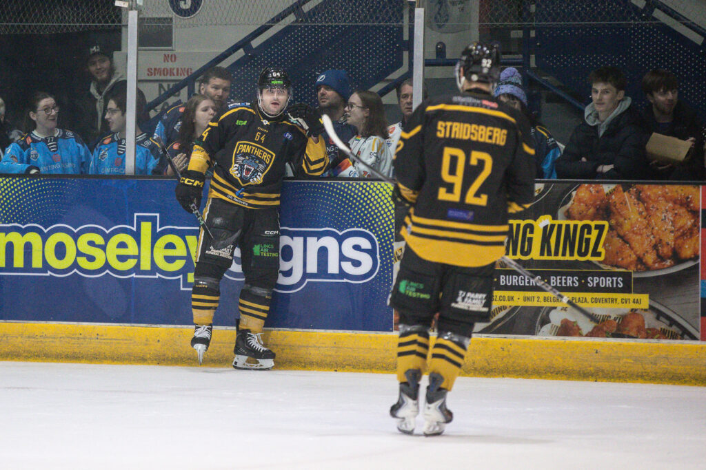 Panthers players celebrate.